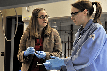 Photo of Amanda Morris with a student