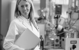 Young female chemist in a lab stock image