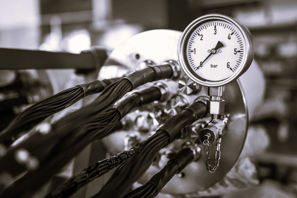 High Pressure in Chemistry blog post showing pressure gauge applied to equipment