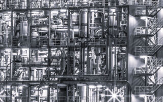 Large scale chicla plant at night for blog Improve Chemical Synthesis Figure 2