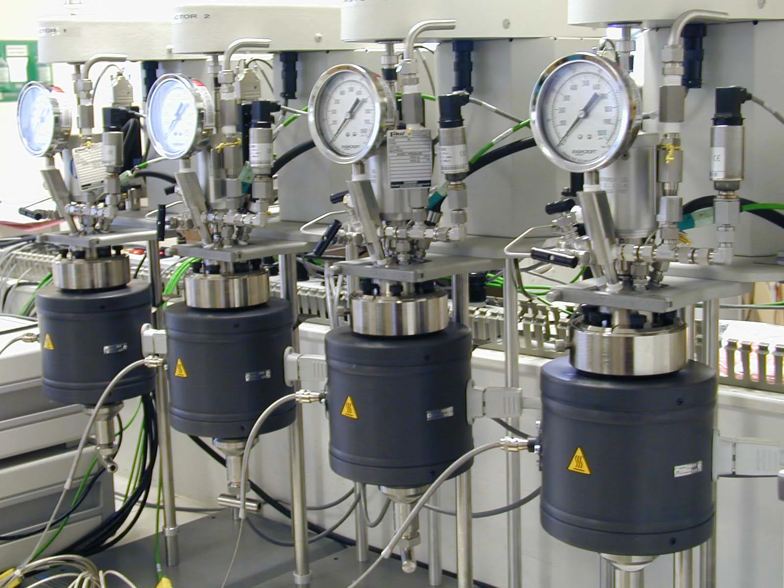 Row of AutoLAB high pressure reactors with gauges