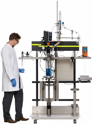 Scientist working with an AutoLAB automated reactor system