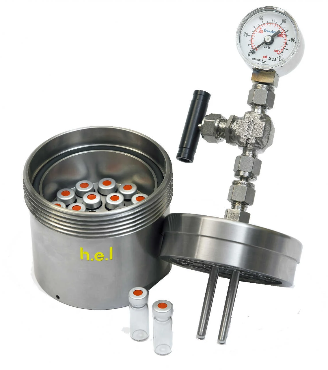CAT block open with vials seated and the cold-finger lid alongside